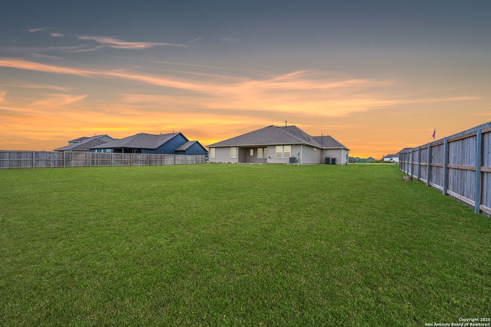 125 Nicks Cove Lockhart, TX 78644 - Photo 35 of 40 a view of an house with backyard and garden