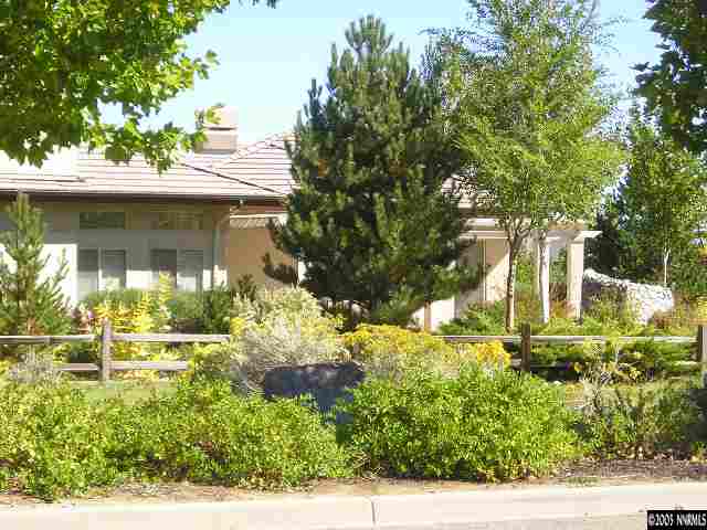 621 Meadowgate Court Reno, NV 89519 - Photo 7 of 9 a front view of a house with a yard