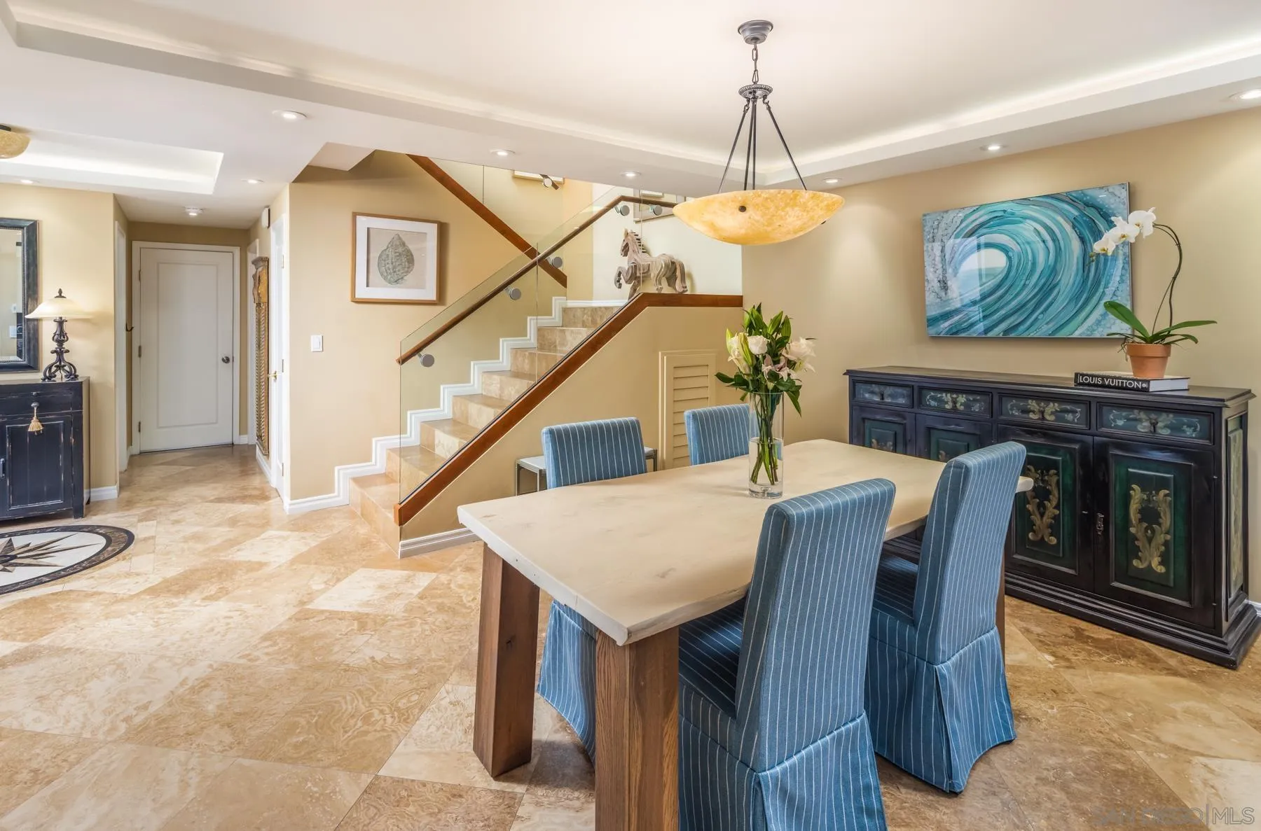 89 Trinidad Bend Coronado, CA 92118 - Photo 16 of 40 a dining room with furniture and window