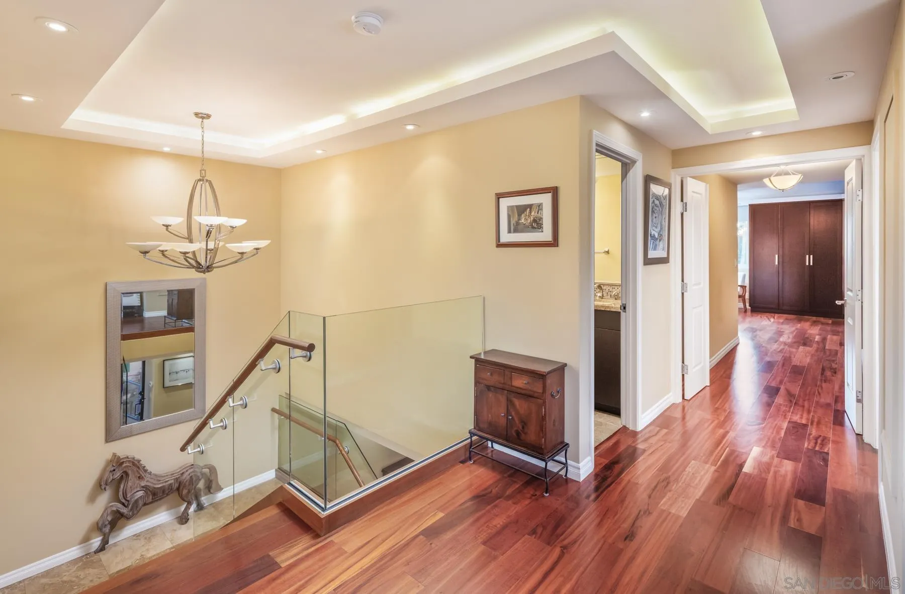 89 Trinidad Bend Coronado, CA 92118 - Photo 18 of 40 a view of entryway and hall with wooden floor