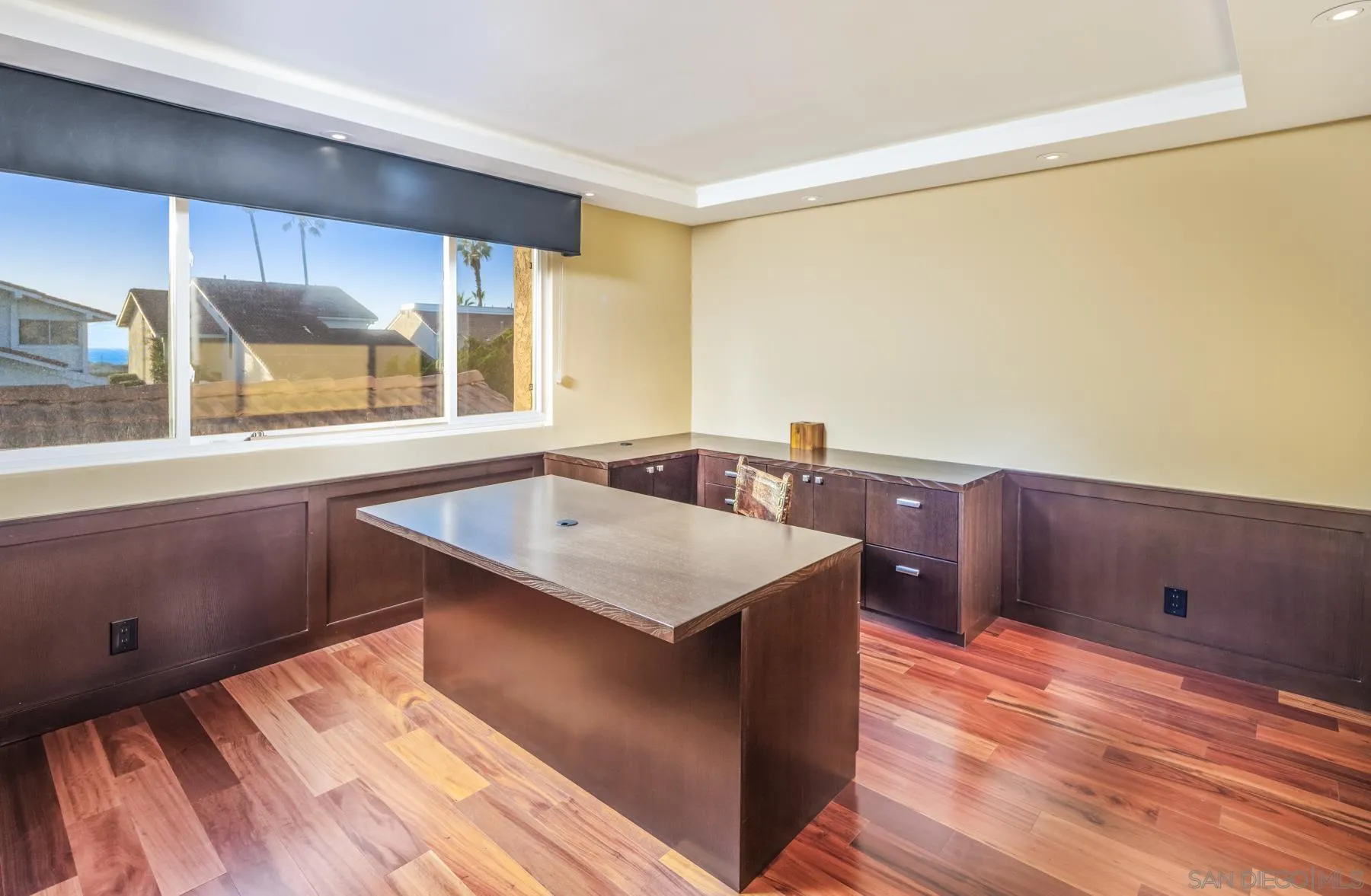 89 Trinidad Bend Coronado, CA 92118 - Photo 22 of 40 a kitchen with a stove and a wooden floor