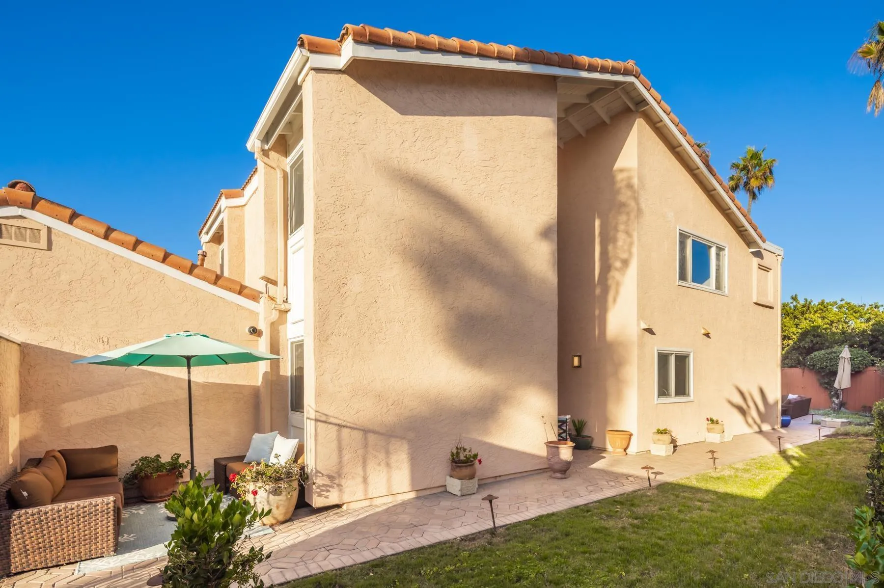 89 Trinidad Bend Coronado, CA 92118 - Photo 28 of 40 a front view of a house with a yard