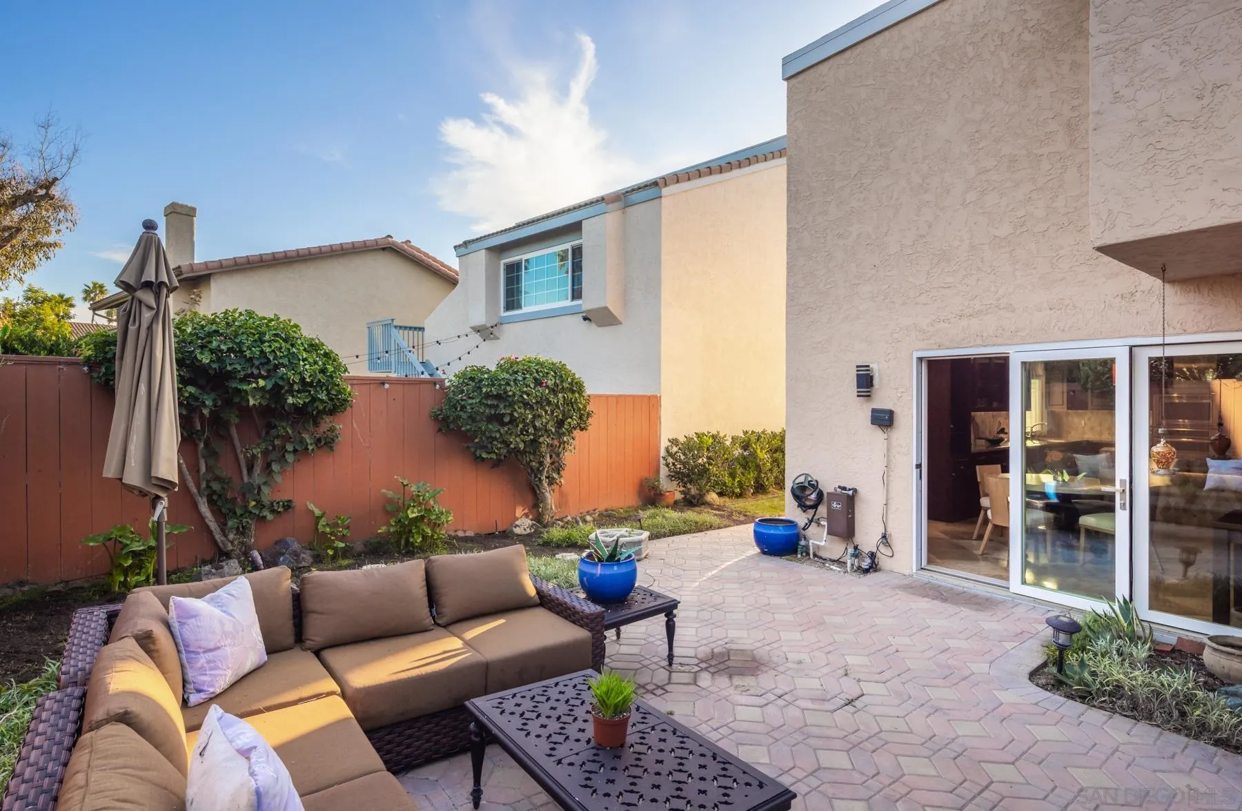 89 Trinidad Bend Coronado, CA 92118 - Photo 32 of 40 a building outdoor space with patio furniture