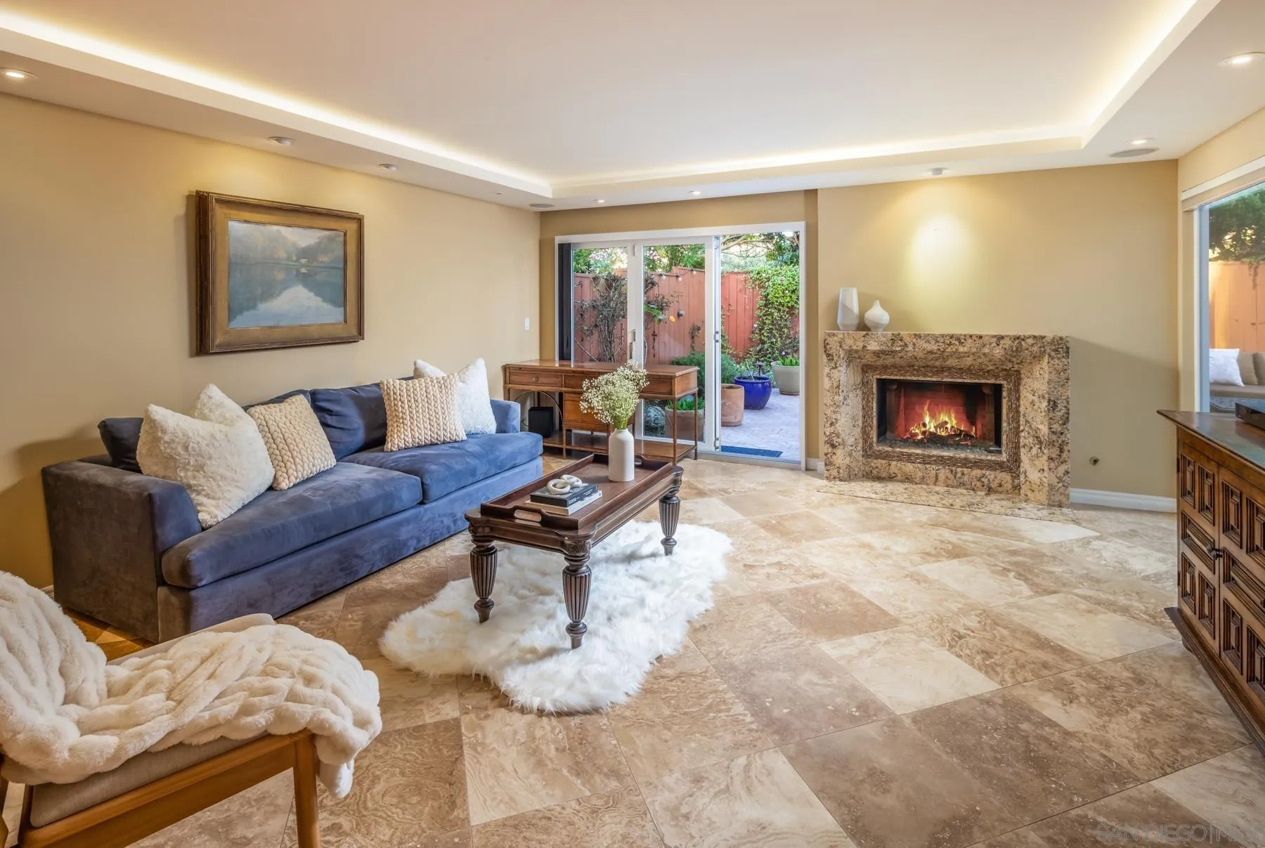 89 Trinidad Bend Coronado, CA 92118 - Photo 8 of 40 a living room with furniture and a fireplace