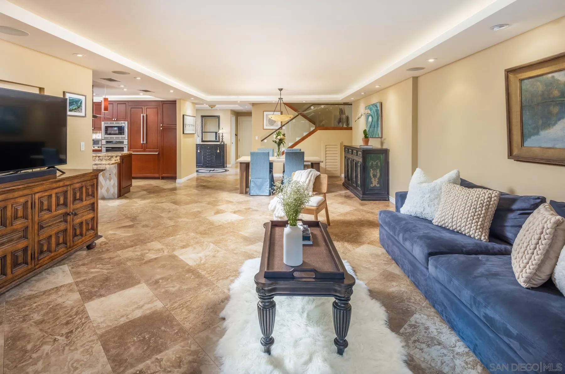 89 Trinidad Bend Coronado, CA 92118 - Photo 9 of 40 a living room with furniture and a flat screen tv