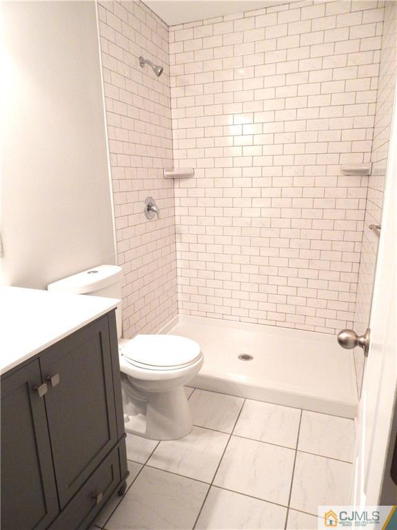 67 Princeton Road Old Bridge, NJ 08859 - Photo 22 of 24 a bathroom with a toilet and shower