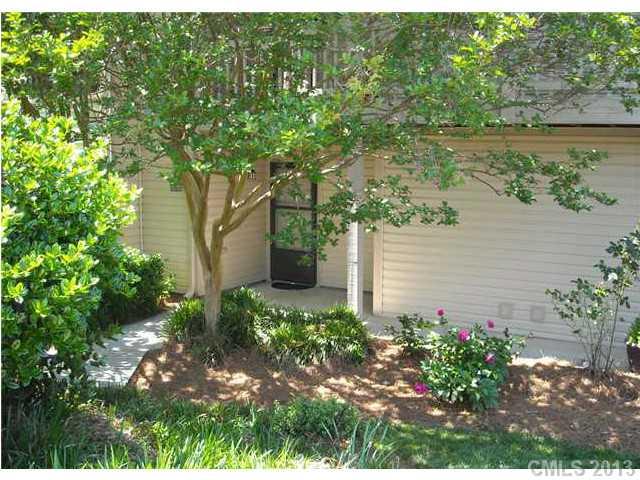 11006 Running Ridge Road, Unit 8441 Charlotte, NC 28226 - Photo 1 of 12 a view of a garden with lake