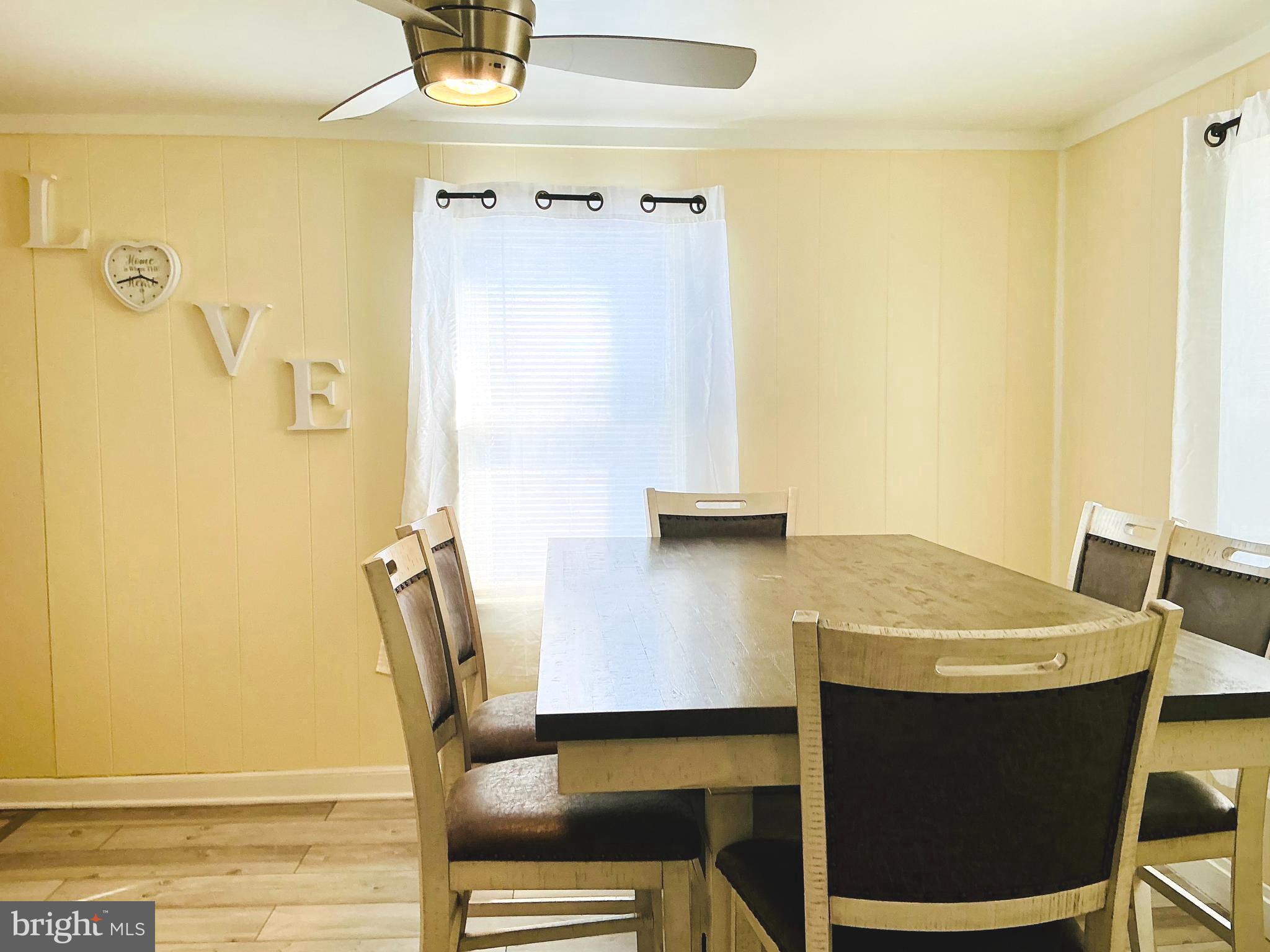1102 Rana Villa Avenue Camp Hill, PA 17011 - Photo 11 of 41 a view of a dining room with furniture and wooden floor
