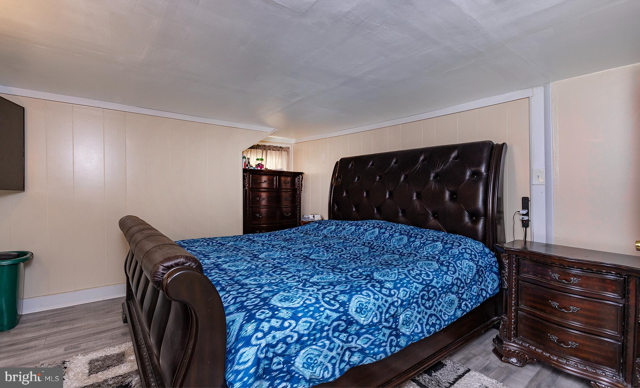 1102 Rana Villa Avenue Camp Hill, PA 17011 - Photo 23 of 41 a bedroom with a bed and cabinet