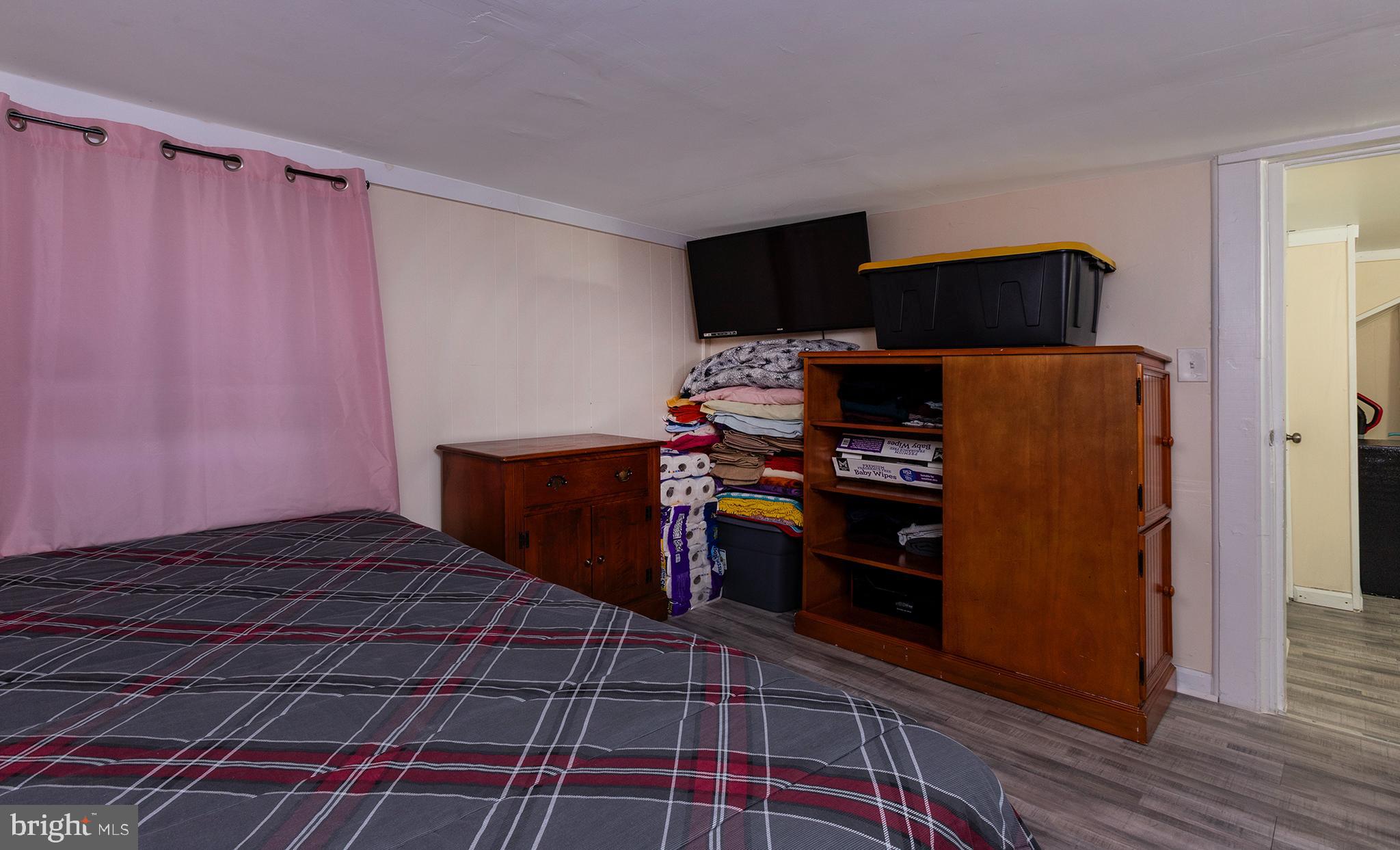 1102 Rana Villa Avenue Camp Hill, PA 17011 - Photo 27 of 41 a bed room with a bed and a closet