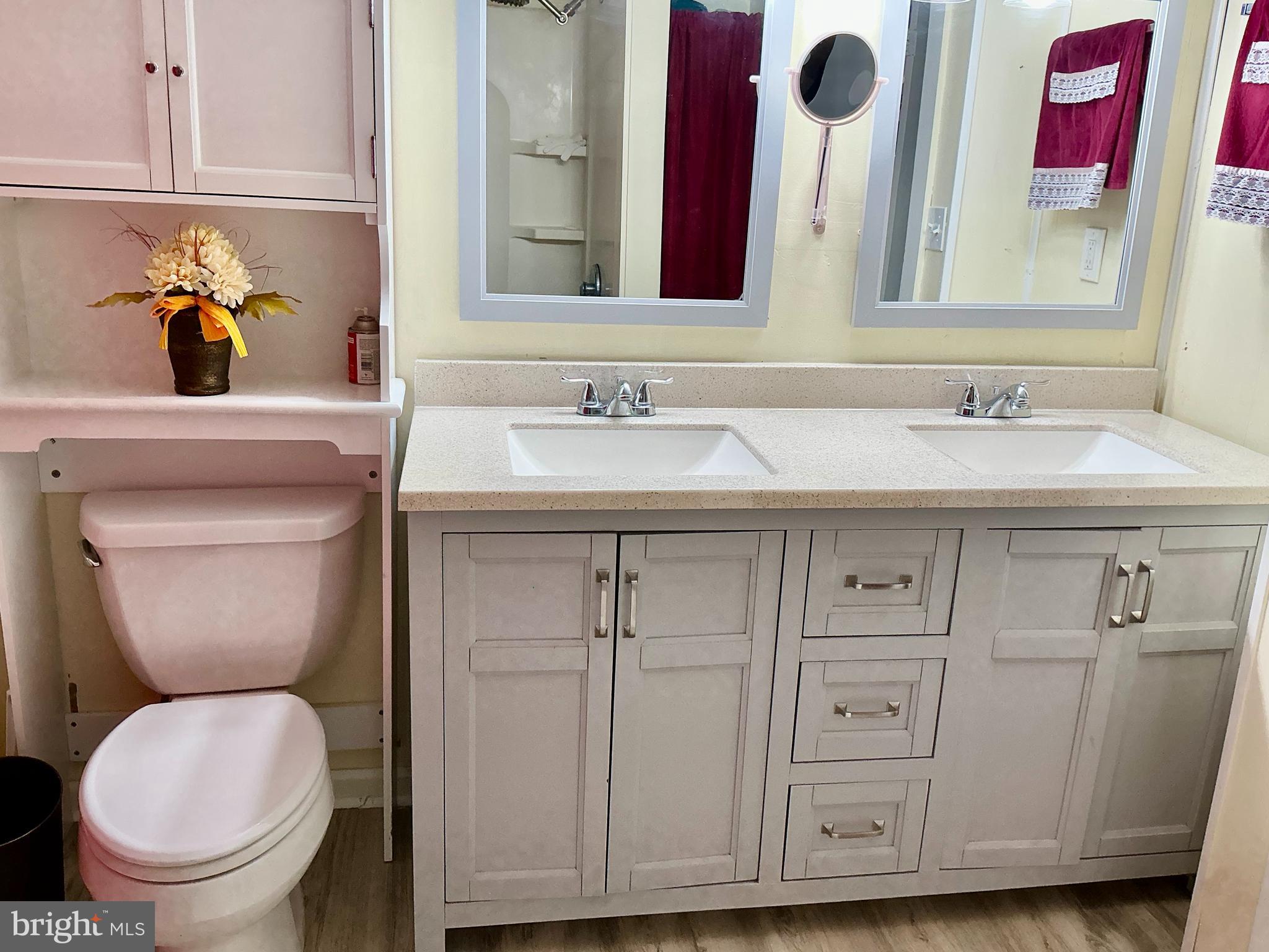 1102 Rana Villa Avenue Camp Hill, PA 17011 - Photo 29 of 41 a bathroom with a toilet sink and mirror