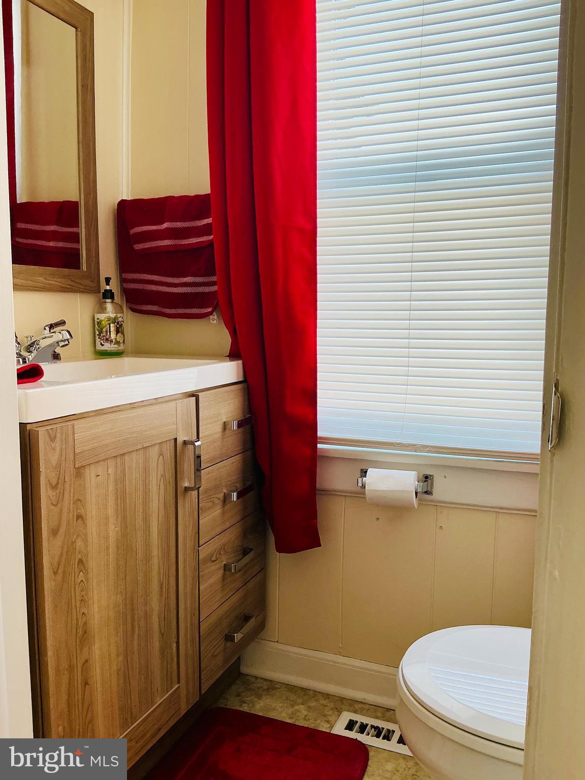 1102 Rana Villa Avenue Camp Hill, PA 17011 - Photo 8 of 41 a bathroom with a toilet and a sink
