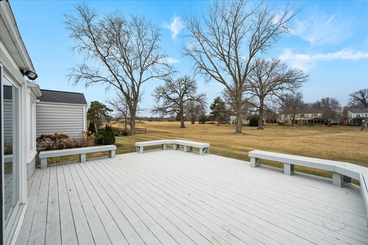 32 Dunham Place St. Charles, IL 60174 - Photo 11 of 56 a view of a patio with chairs and wooden floor