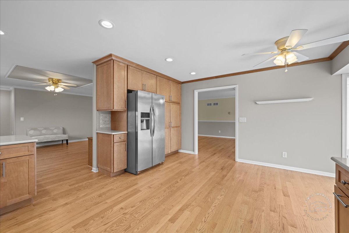 32 Dunham Place St. Charles, IL 60174 - Photo 18 of 56 a kitchen with stainless steel appliances a refrigerator and wooden floor