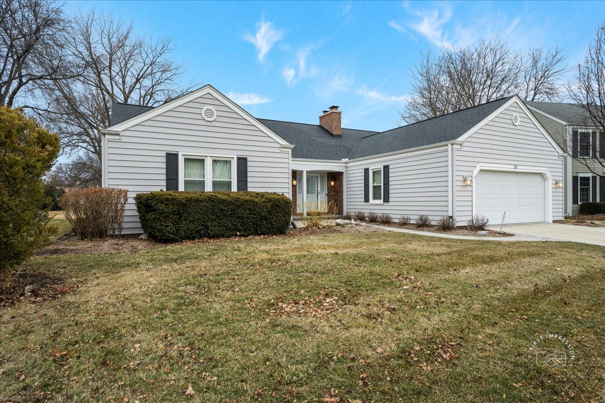 32 Dunham Place St. Charles, IL 60174 - Photo 2 of 56 a view of a house with a yard