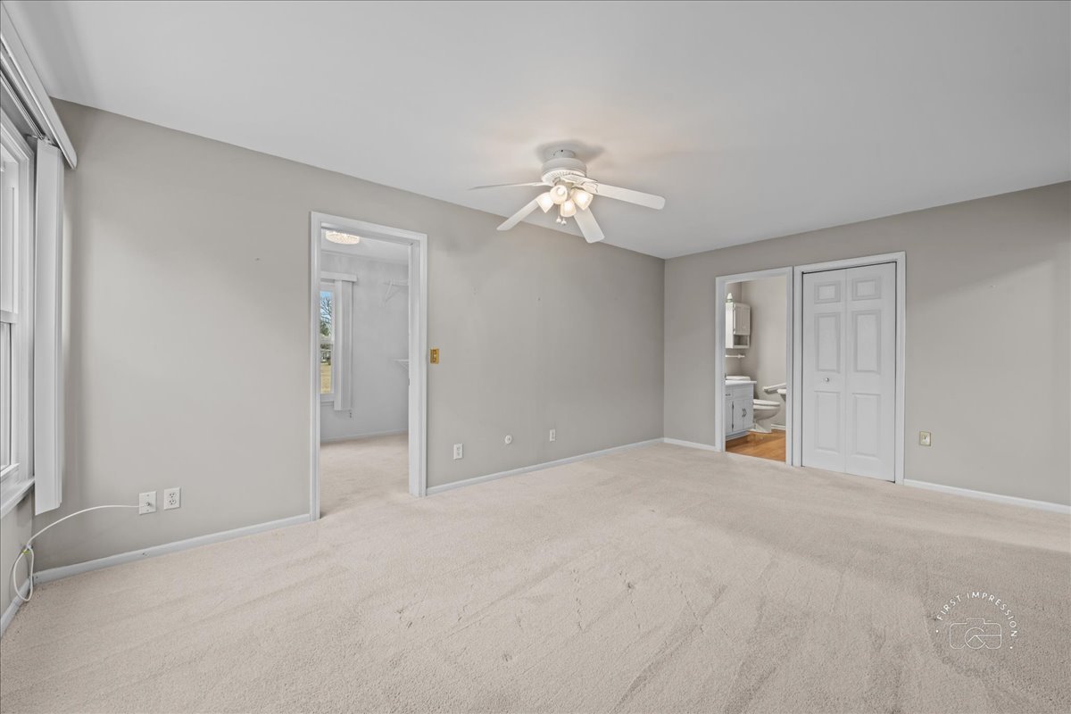 32 Dunham Place St. Charles, IL 60174 - Photo 23 of 56 a view of empty room with a ceiling fan