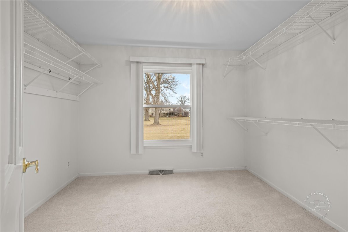 32 Dunham Place St. Charles, IL 60174 - Photo 24 of 56 an empty room with a window