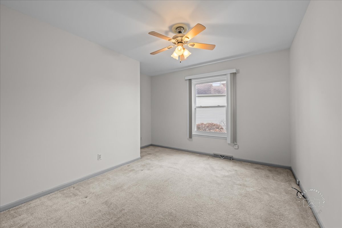 32 Dunham Place St. Charles, IL 60174 - Photo 29 of 56 a view of an empty room with a window
