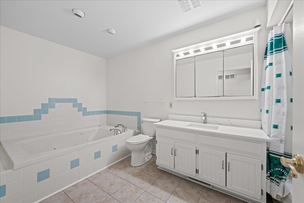 32 Dunham Place St. Charles, IL 60174 - Photo 33 of 56 a bathroom with a double vanity sink mirror and toilet