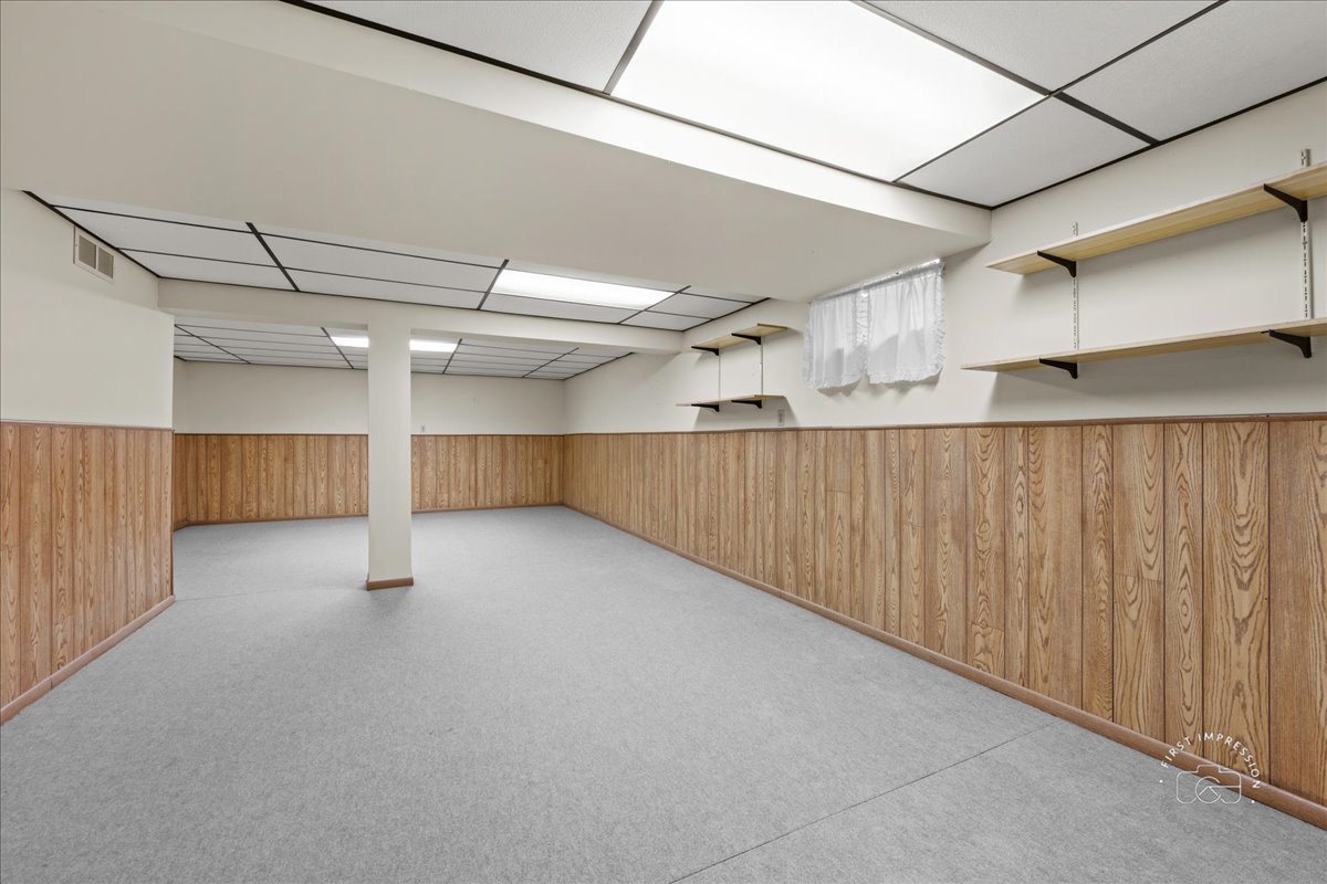 32 Dunham Place St. Charles, IL 60174 - Photo 41 of 56 a view of a room with wooden walls