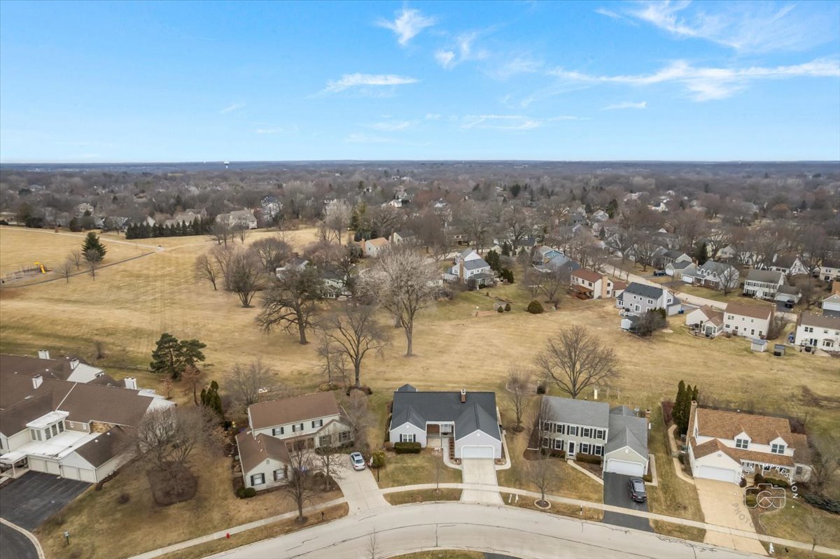 32 Dunham Place St. Charles, IL 60174 - Photo 50 of 56 an aerial view of a house with a lake view