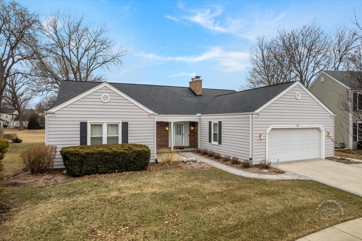 32 Dunham Place St. Charles, IL 60174 - Photo 56 of 56 a front view of a house with a yard