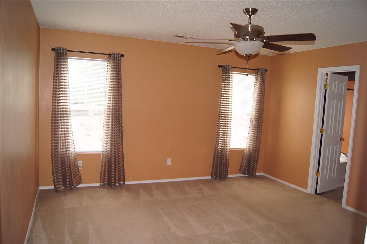 3029 Varcroft Road Knightdale, NC 27545 - Photo 17 of 25 a view of an empty room with a window