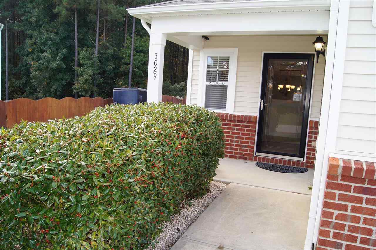 3029 Varcroft Road Knightdale, NC 27545 - Photo 3 of 25 front view of a house with a yard