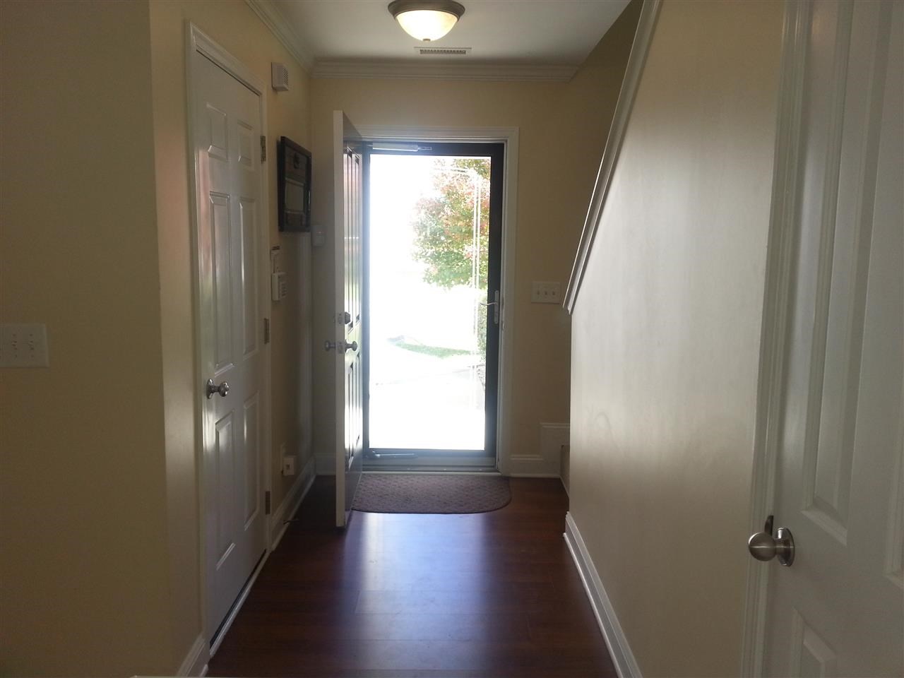 3029 Varcroft Road Knightdale, NC 27545 - Photo 4 of 25 a view of hallway with windows and stairs