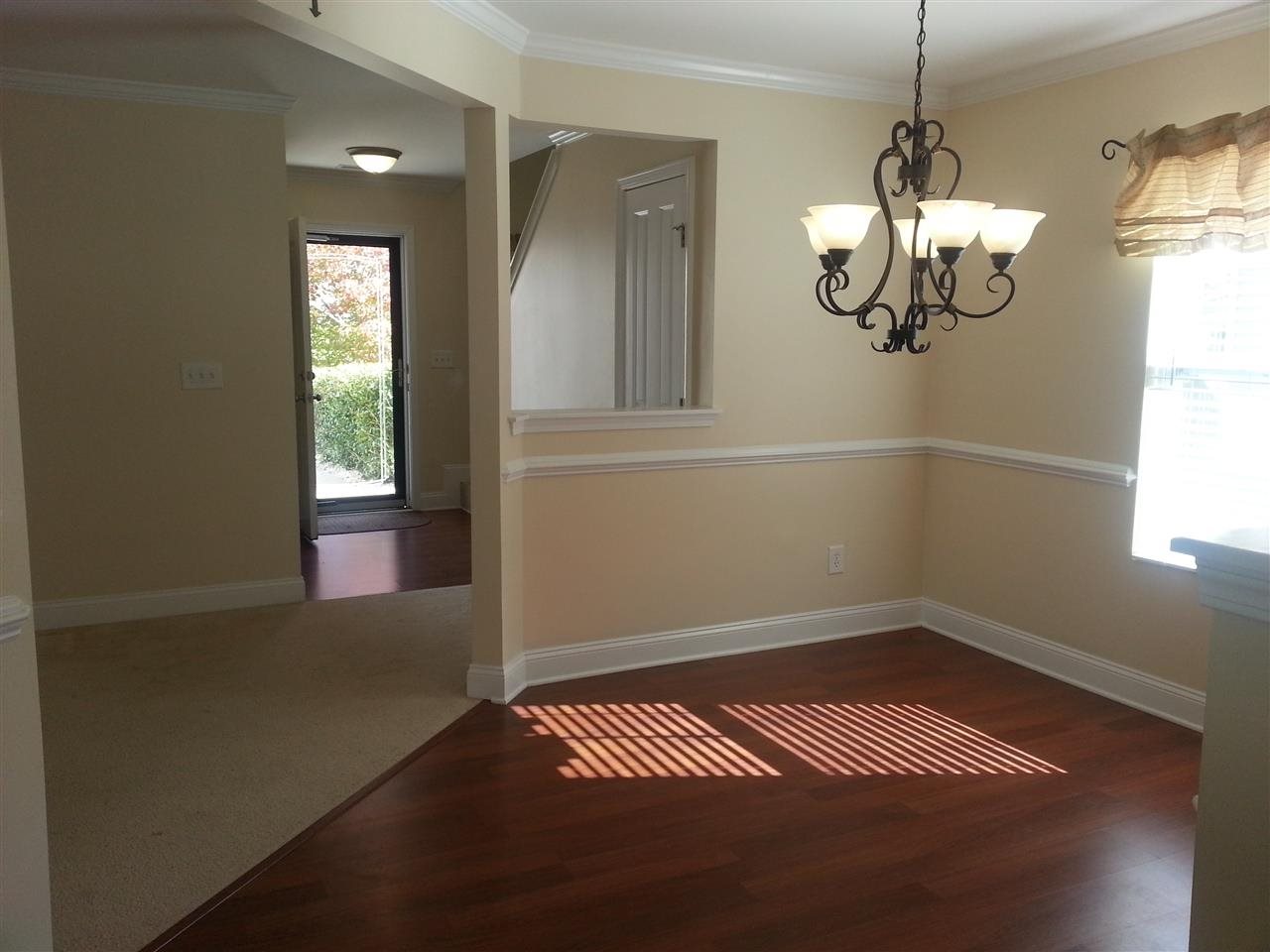 3029 Varcroft Road Knightdale, NC 27545 - Photo 6 of 25 a view of empty room with wooden floor and fan