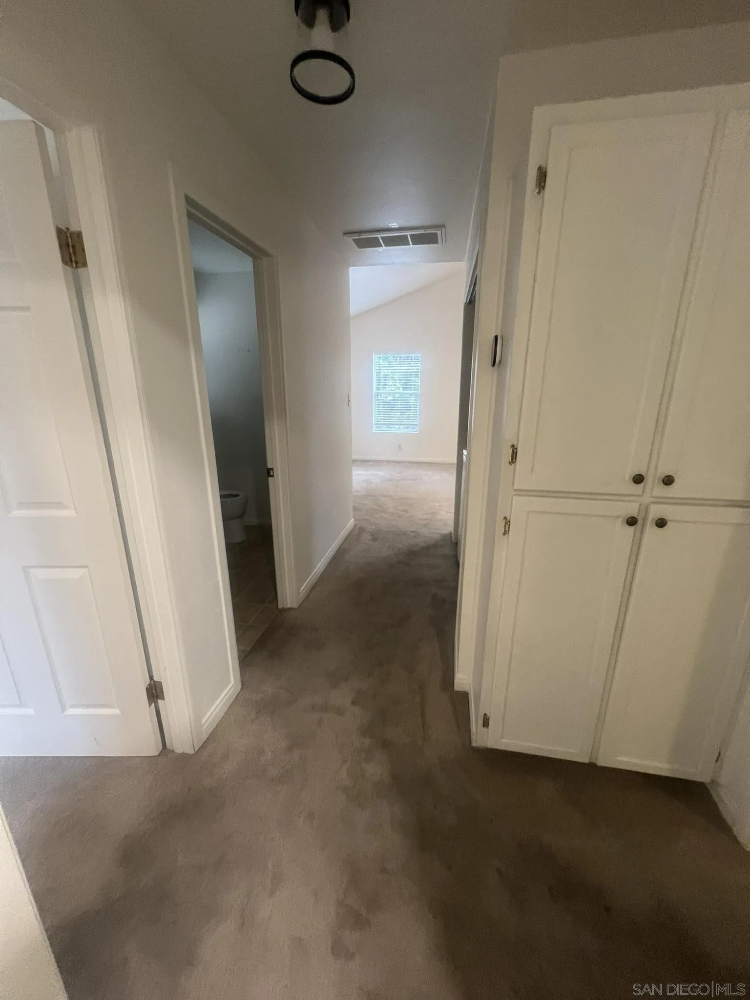 1927 3rd Street Julian, CA 92036 - Photo 6 of 11 an empty room with windows