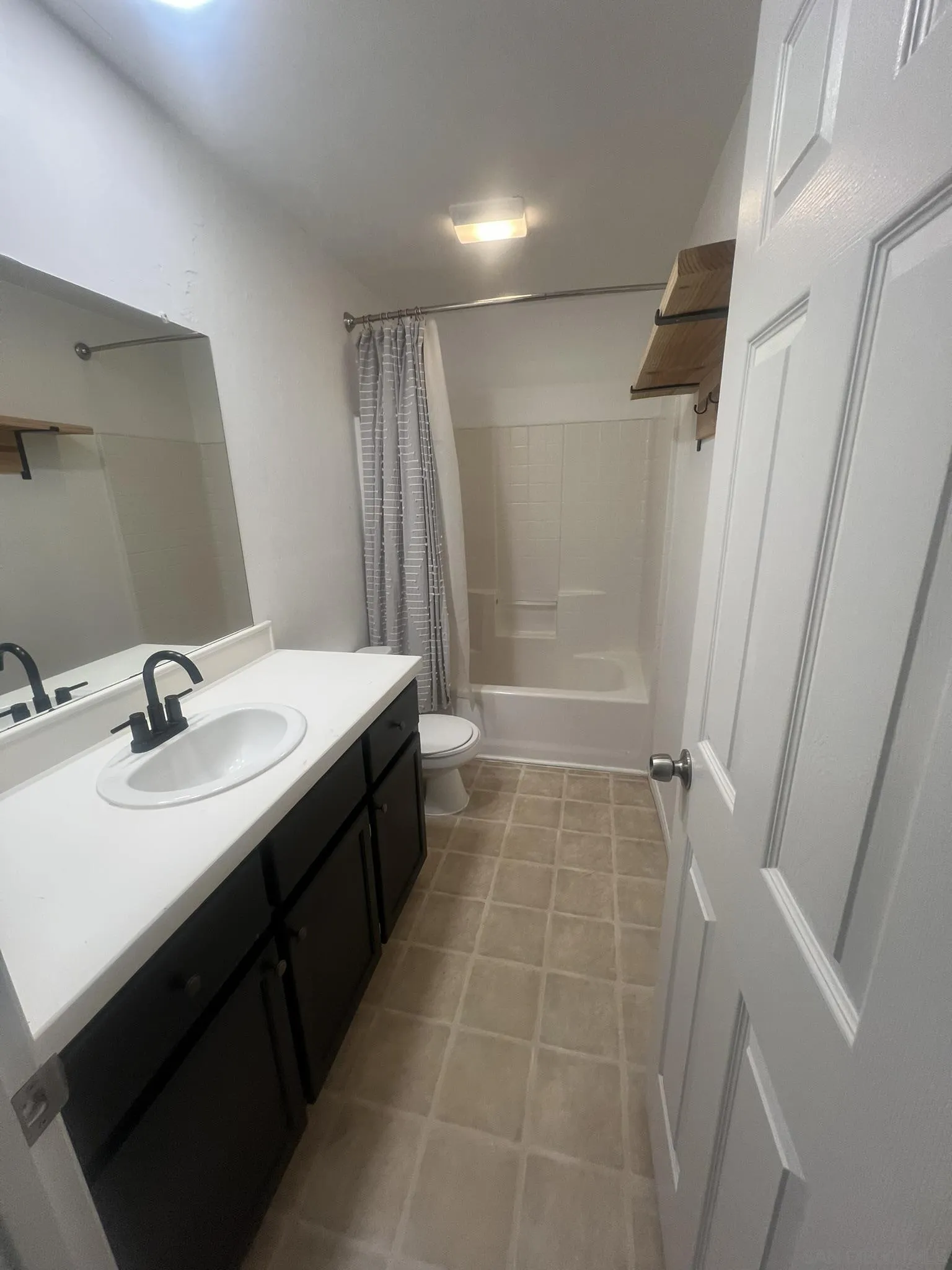 1927 3rd Street Julian, CA 92036 - Photo 7 of 11 a bathroom with a double vanity sink a toilet and a mirror