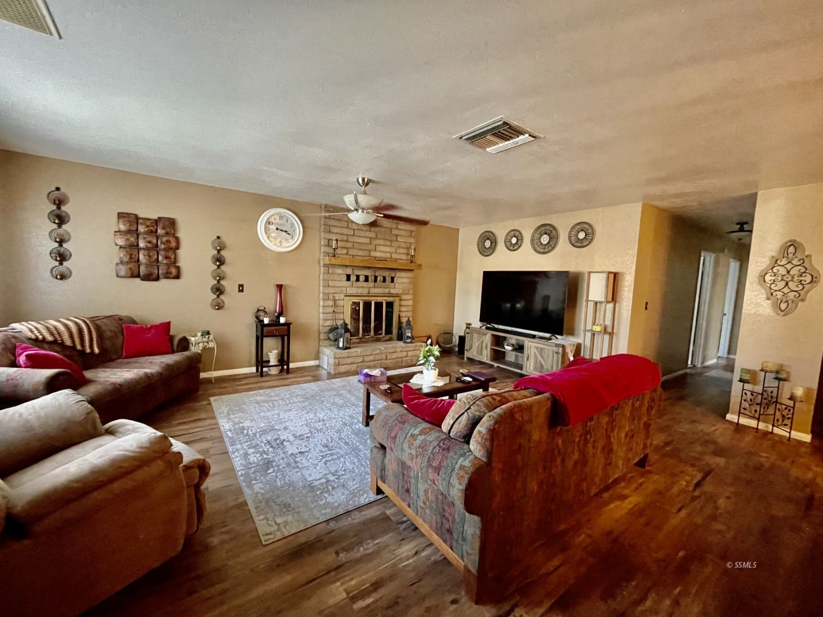 429 South Fountain Street Ridgecrest, CA 93555 - Photo 5 of 33 a living room with furniture and a flat screen tv