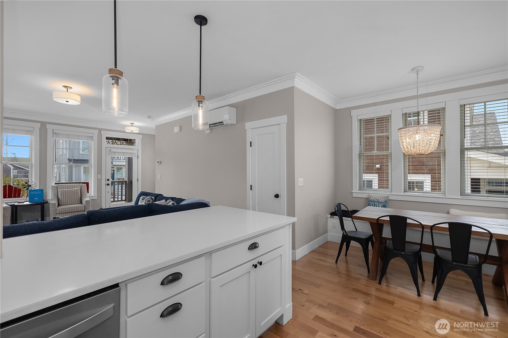 74 Horizon Street Pacific Beach, WA 98571 - Photo 11 of 33 a kitchen with center island table and chairs