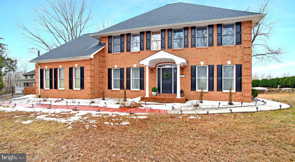 8241 Surratts Road Clinton, MD 20735 - Photo 1 of 55 a front view of a house with a yard