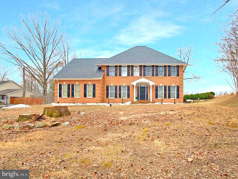 8241 Surratts Road Clinton, MD 20735 - Photo 2 of 55 a front view of a house with a yard