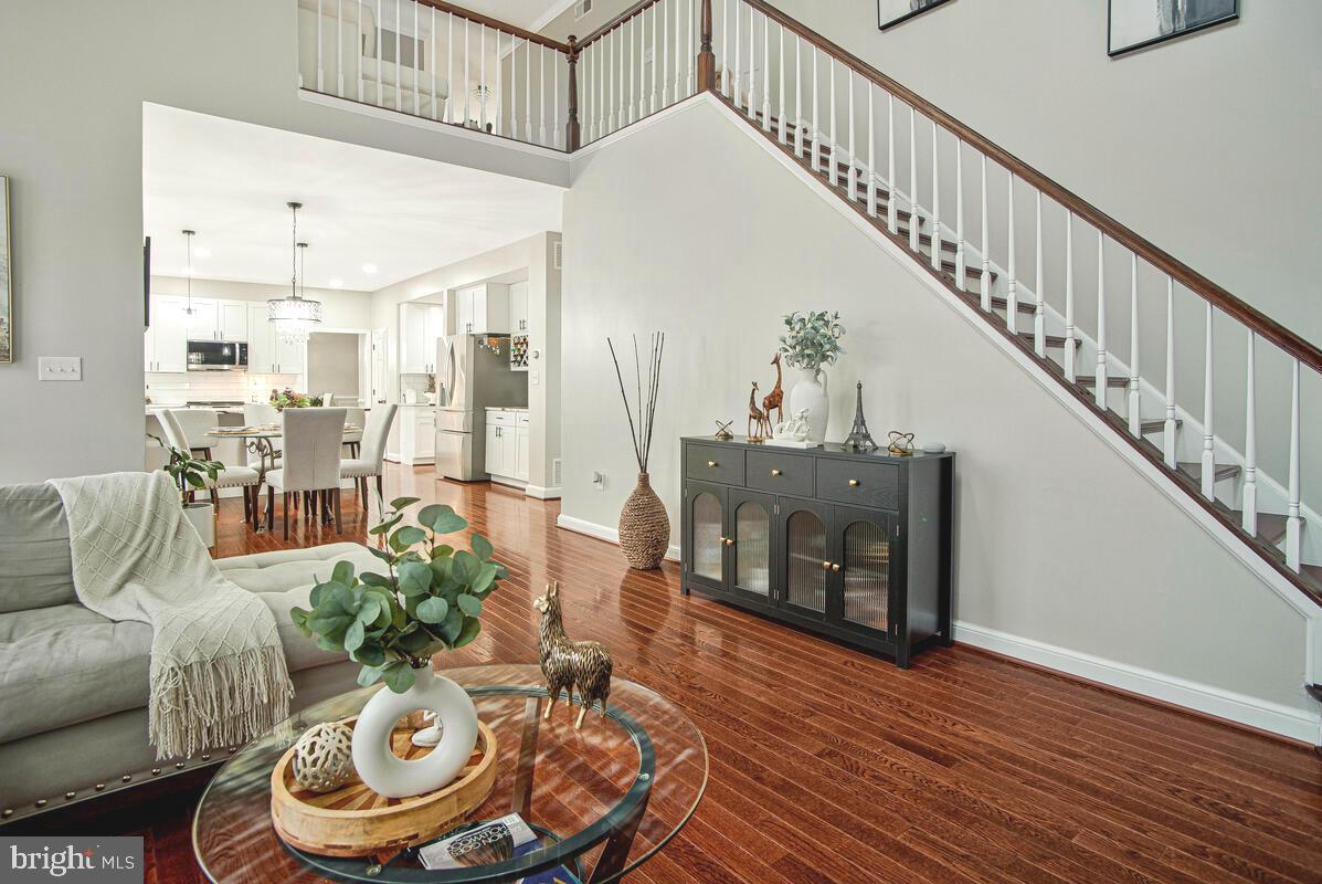 8241 Surratts Road Clinton, MD 20735 - Photo 22 of 55 a living room with furniture and wooden floor