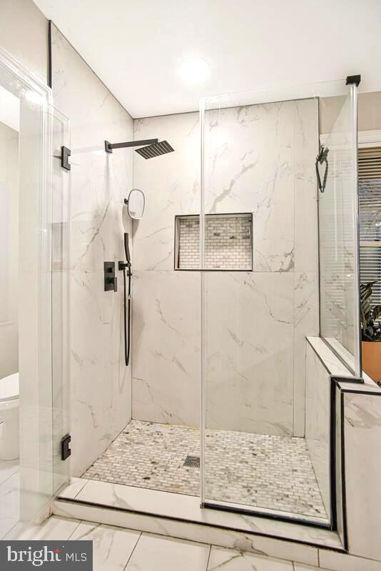 8241 Surratts Road Clinton, MD 20735 - Photo 41 of 55 a bathroom with a shower