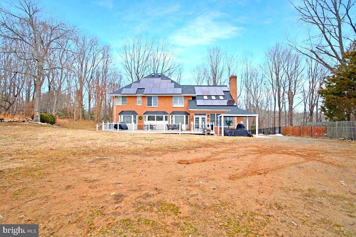 8241 Surratts Road Clinton, MD 20735 - Photo 55 of 55 a front view of a house with a yard