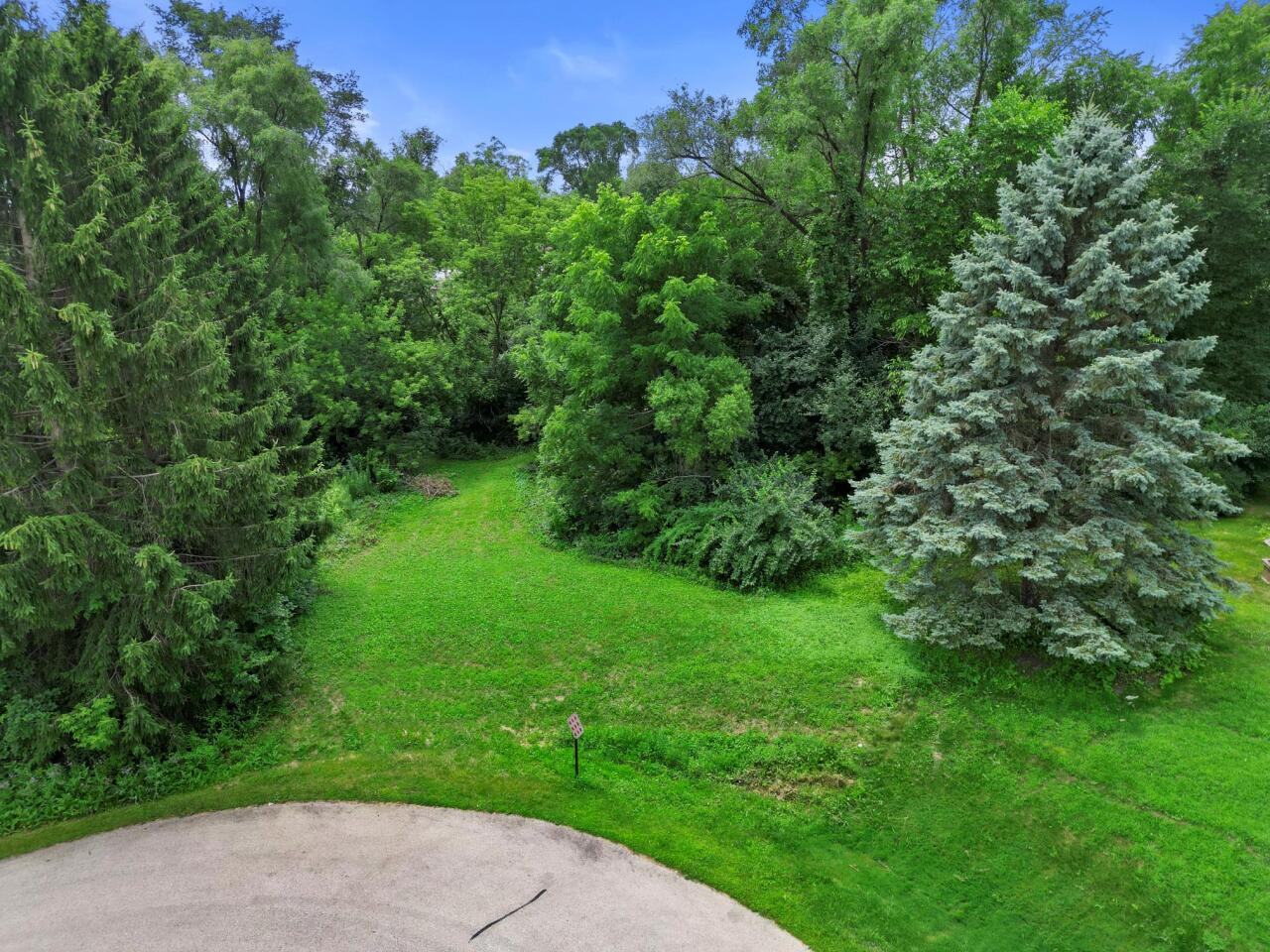 5920 South Racine Avenue, Unit LT2 New Berlin, WI 53146 - Photo 7 of 11 Welcome to lush greenery