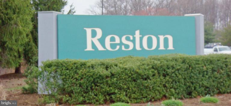 10911 Knights Bridge Court Reston, VA 20190 - Photo 24 of 30 a sign broad in front of a white house