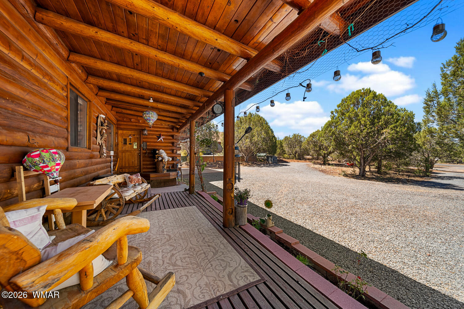 6720 Cheney Ranch Loop Show Low, AZ 85901 - Photo 5 of 55 a view of a balcony with chairs