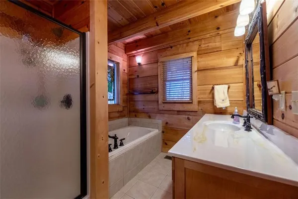 a view of an entryway with wooden floor and stairs