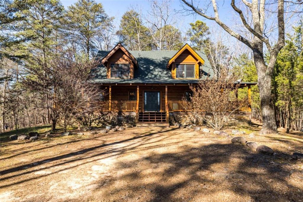 2077 Big Texas Valley Road Northwest Rome, GA 30165 - Photo 42 of 42 a view of house with wooden fence