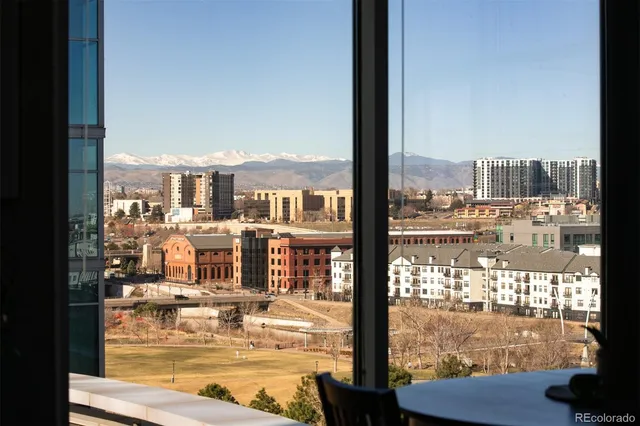 a view of a balcony with city view