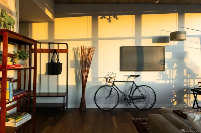 a view of entryway with wooden floor and windows