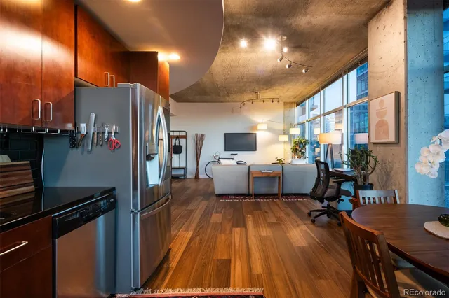 a kitchen with a table and chairs in it