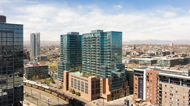 a view of a city with tall buildings