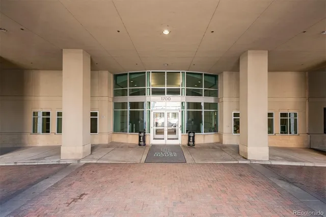 a swimming pool with outdoor seating and yard