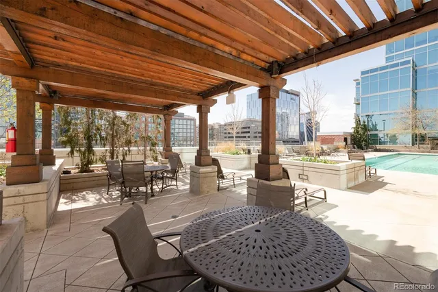 a view of a swimming pool with a bench